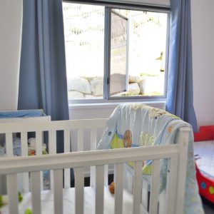 Crimsafe security window with safe-s-cape installed in children's bedroom