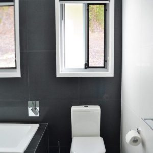 Crimsafe security screens installed in bathroom above toilet Crimsafe security screens installed in bathroom above toilet