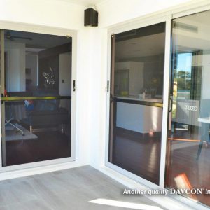 Crimsafe security screen installed on back deck of home Crimsafe security screen installed on back deck of home