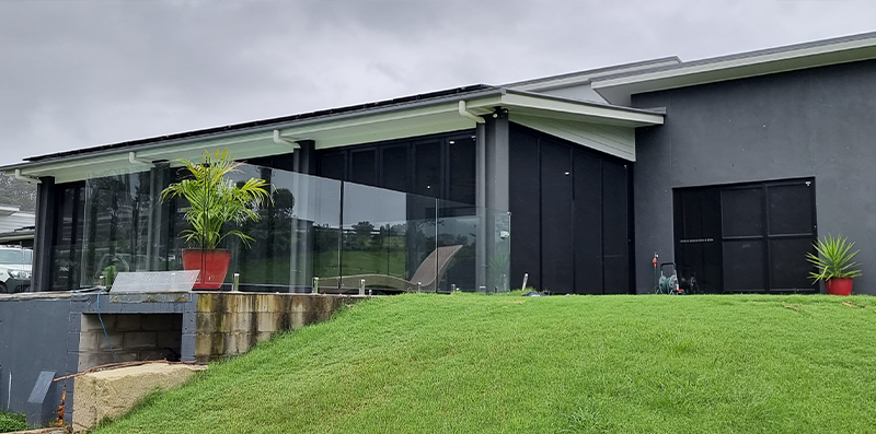 Black Crimsafe Ultimate patio enclosure installed by Davcon Security Screens