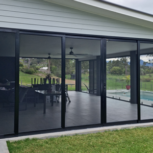 Black Crimsafe Ultimate patio enclosure installed by Davcon Security Screens