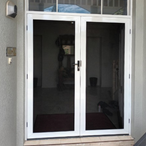 Crimsafe Ultimate Double Hinged Doors in Pearl White installed by Davcon