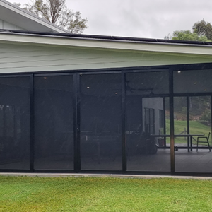 Black Crimsafe Ultimate patio enclosure installed by Davcon Security Screens